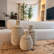 Contenitori in bambù ricoperti di perline