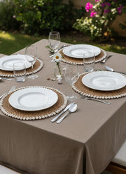 Sottopiatto intrecciato in rattan con conchiglie